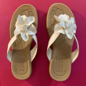 White flowered sandals